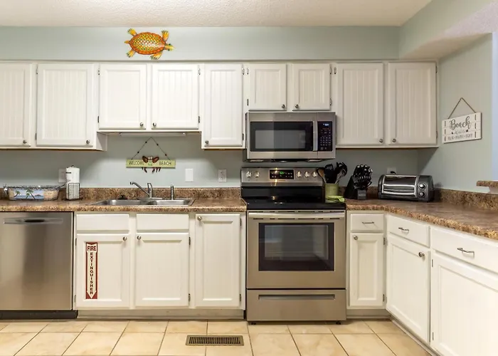 Holiday home Sea Oats Beachfront Condo: Renovated 2br With Pools And Pier Access